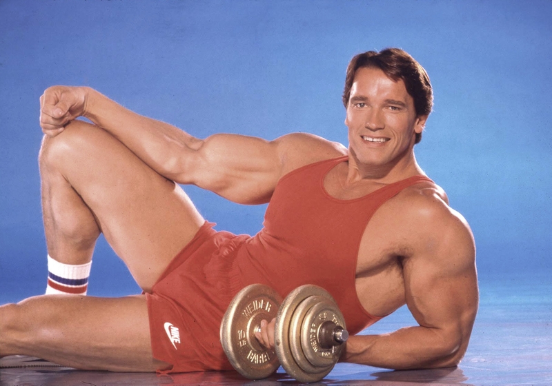 Arnold Schwarzenegger – Then | Getty Images Photo by Harry Langdon