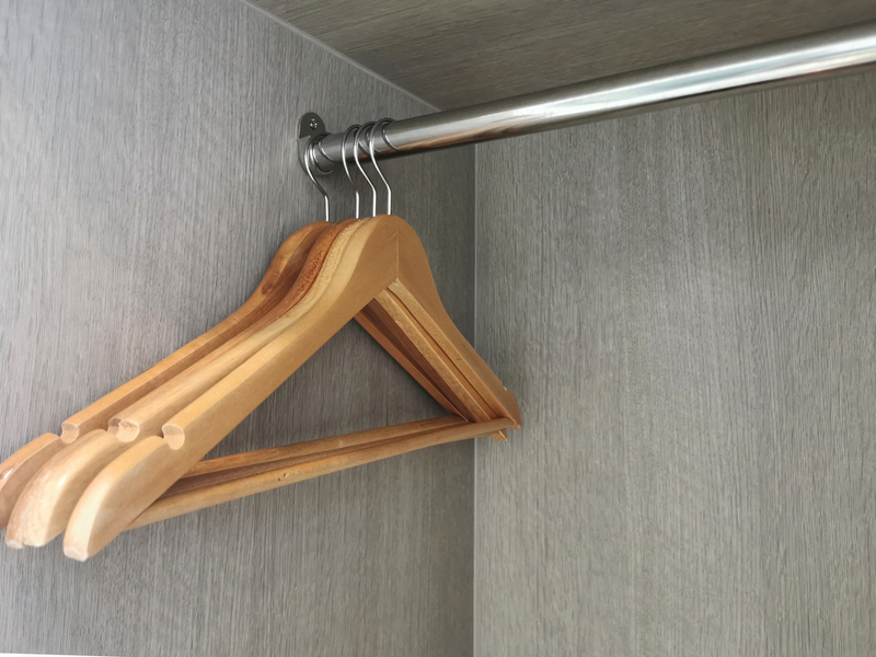 Use a Hanger to Hold the Door | Omkoi/Shutterstock