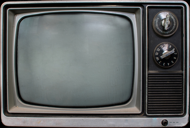 Using knobs on the TV to change channels | Scott Chimber Photography/Shutterstock