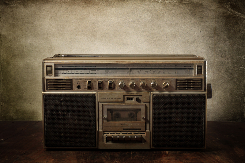 Taping Tunes Off the Radio | Shutterstock Photo by Ekkamai Chaikanta