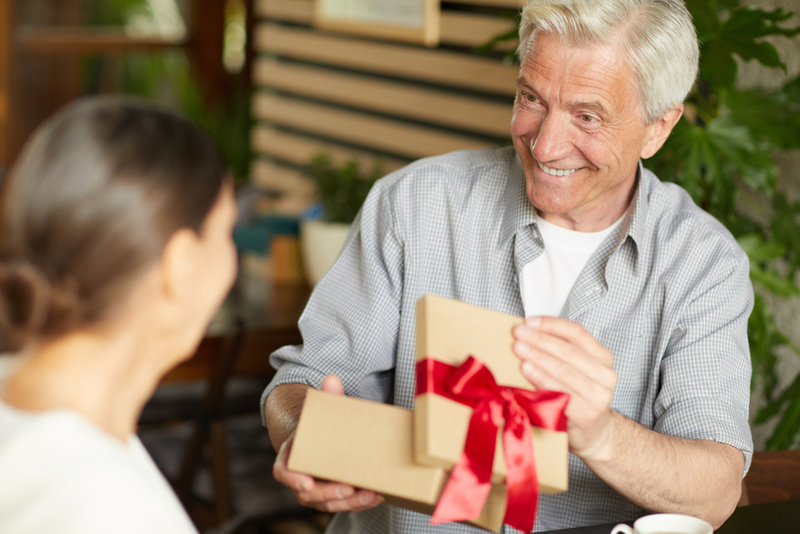 Opening Presents at the Party | Shutterstock