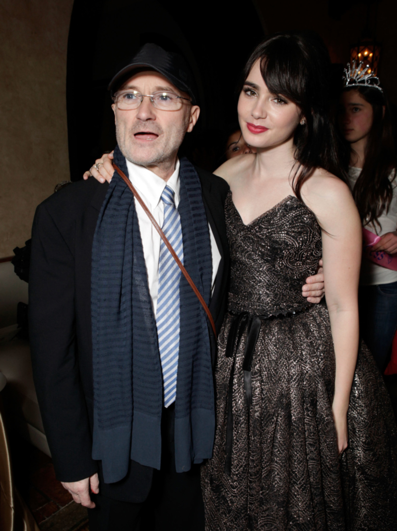 Phil Collins & Lily Collins | Getty Images Photo by Todd Williamson