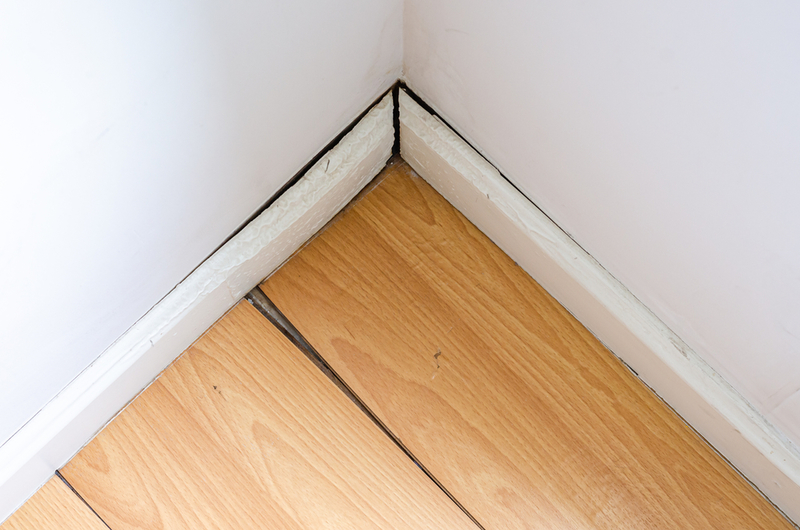 Getting into the Cracks in Baseboards | Shutterstock