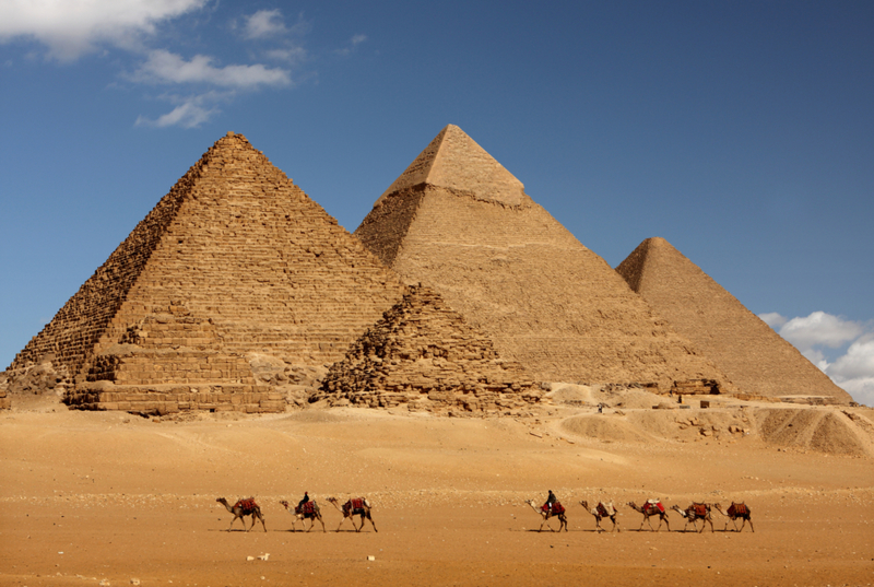 The Pyramids of Giza Then | Getty Images Photo by sculpies