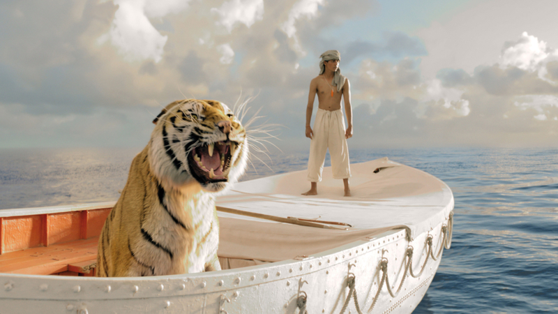 El chico y su tigre | Alamy Stock Photo